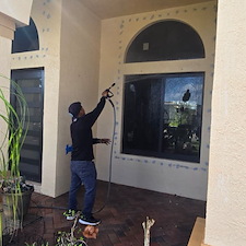 Pressure-washingPressure-Cleaning-a-residential-home-located-at-Boynton-Beach-FL-33472 1